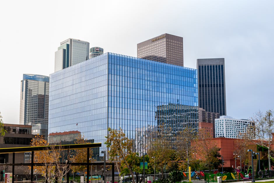 Vibrant modern skyline of downtown Los Angeles, featuring iconic skyscrapers on a clear day.